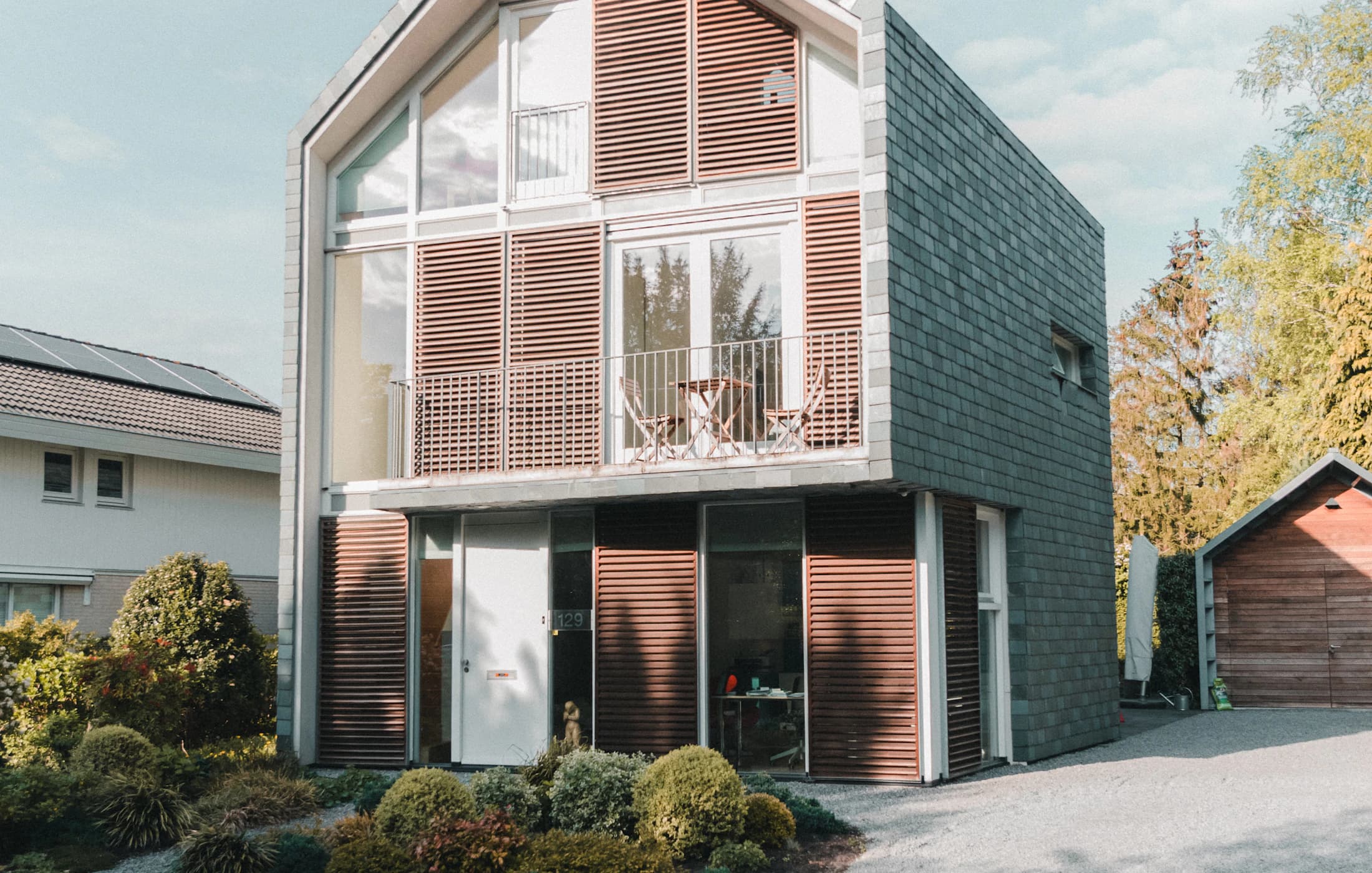 Modern energy-efficient home with rooftop solar panels